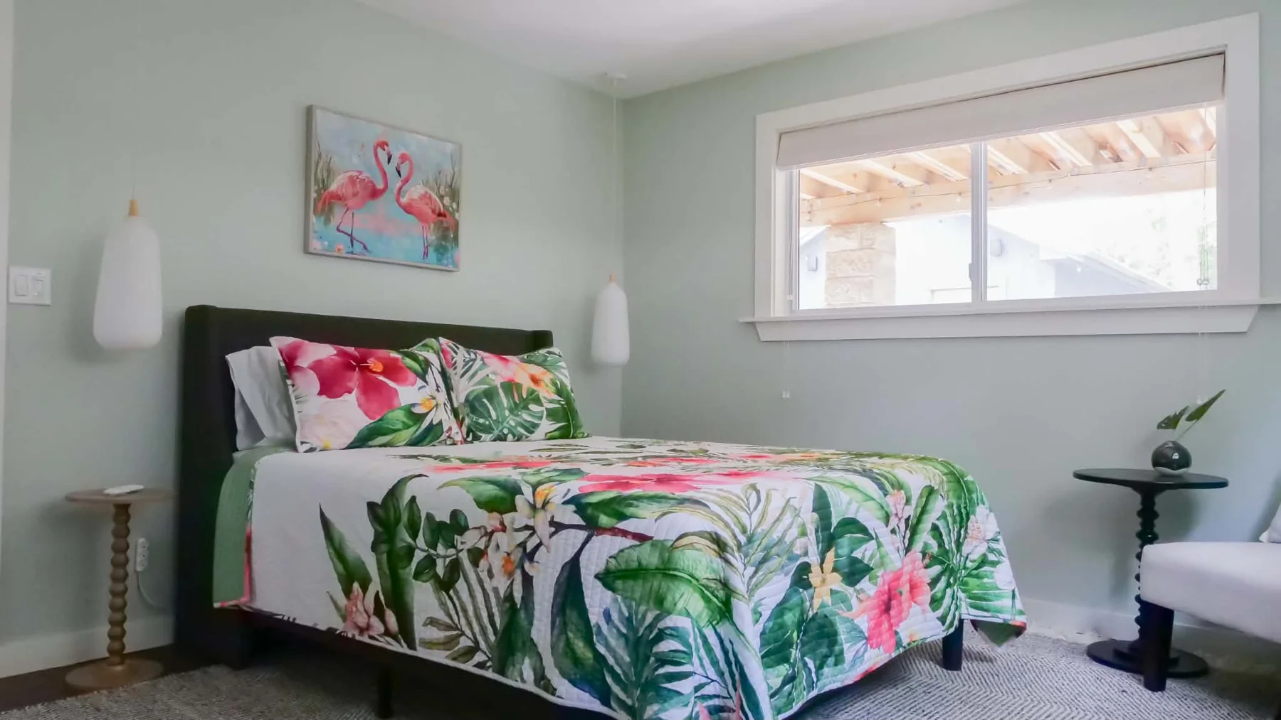 Bedroom with hibiscus-patterned bedding